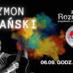 Tymon Tymański podczas koncertu z gitarą